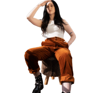 White ribbed top, rust corduroy pants